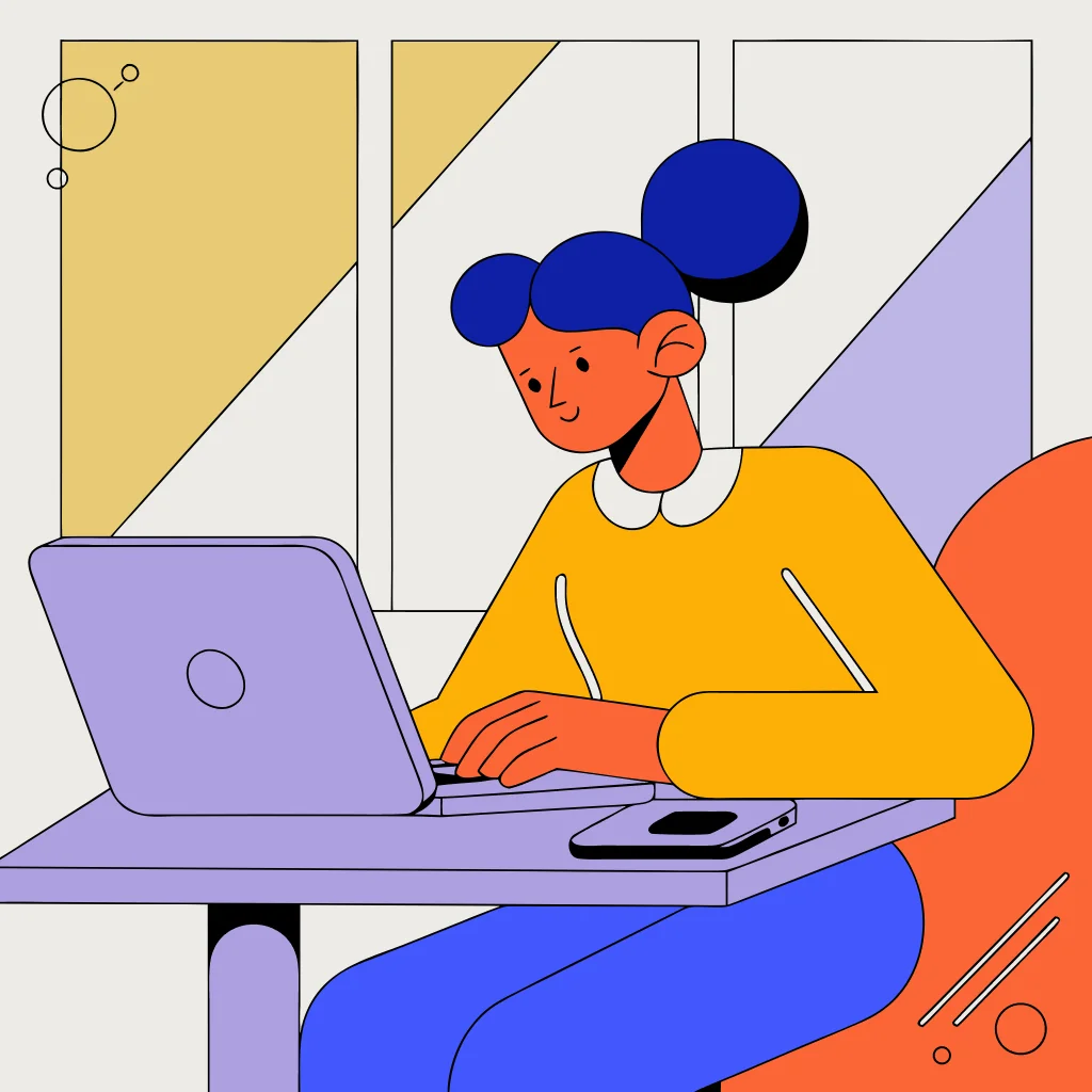 A person using a trusted second device to seek digital-safety support while a possibly monitored phone remains aside.